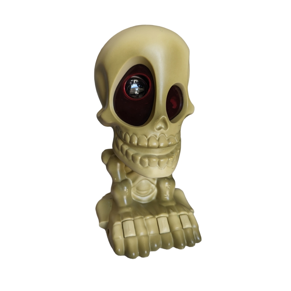 Swiveling Head Skeleton w/ Purple Light-Up Eye Projects Ghost On Wall/ Ceiling